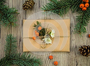 Christmas presents wrapped in kraft paper with natural decoration. Flat lay, top view