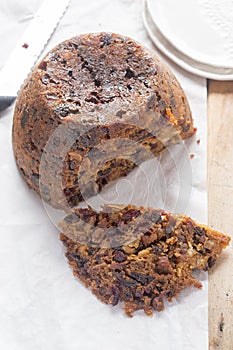 Christmas pudding with cranberries, raisins and prunes, whiskey