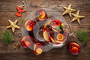 Christmas punch. Festive red hot toddy cocktail, drink with cranberries and citrus fruits