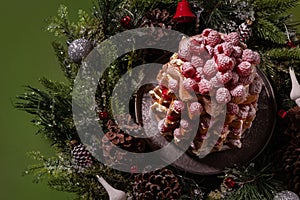 Christmas raspberry decorated Italian sweet bred Pandoro pan d`oro dusted with icing sugar