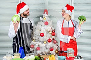 Christmas recipe concept. Secret ingredient is love. Couple preparing healthy meal together for christmas dinner