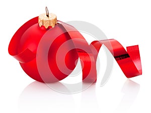 Christmas red bauble and curling paper Isolated on white background