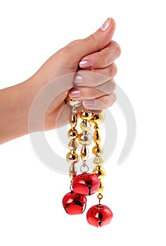 Christmas red bells in hand isolated on white