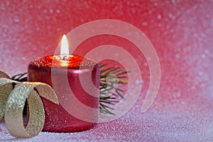 Christmas red candle closeup background