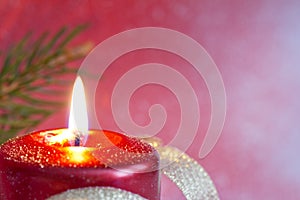 Christmas red candle closeup background