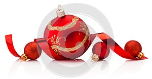 Christmas red decoration baubles and colorful streamers ribbons tape Isolated on white background