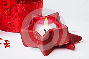 Christmas red decoration with candle around white background