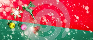 Christmas reindeer snowflake fruits and bell on Red green background with golden snow fall,top  view with copy space