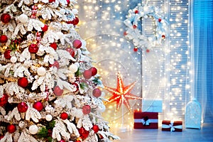 Christmas room interior. Christmas tree decorated with balls and bows, with gifts