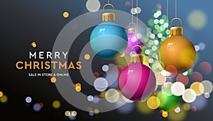 Christmas sale banner with baubles sparkle in blur bokeh effect background