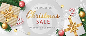 Christmas sale banner template with realistic christmas elements. photo