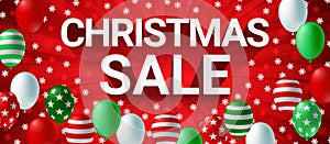 Christmas sale banner winter season with colorful balloon and snowflake on red background.