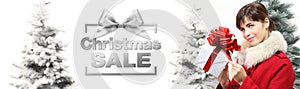 Christmas sale banner woman with gift box on white background wi