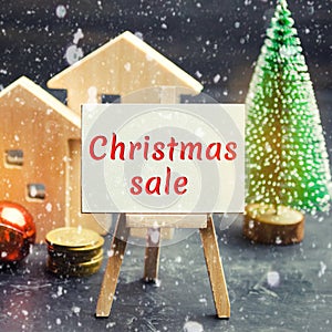 Christmas Sale of Real Estate. New Year discounts for buying housing. Purchase apartments at a low price. Holiday discounts.