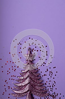 Christmass flatlay christmas tree toy and confeti photo