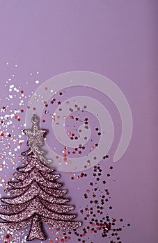 Christmass flatlay christmas tree toy and confeti photo