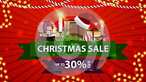 Christmas sale, up to 30% off, red discount banner with ribbons, snow globe, gift with Santa Claus hat, candles, Christmas tree