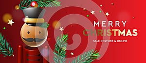 Christmas sale web banner with fir branches border and nutcracker, red background. Bright Christmas and New Year