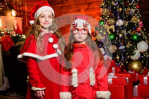 Christmas Sales. small girl kids in red santa hat. christmas time. Love winter holidays. Winter shopping sales. Little