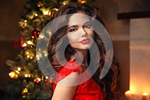 Christmas Santa. Beautiful smiling woman model. Makeup. Healthy