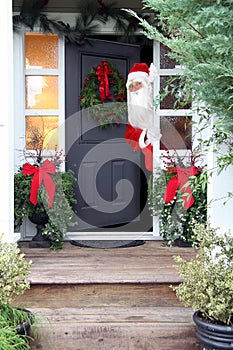 Christmas Santa Claus at the front door.