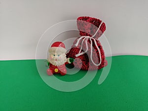 Christmas Santa Claus greets with a big bag of gifts