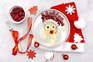 Christmas Santa Claus pancake raspberry,cheese for kids baby children breakfast dinner. xmas food with new year decorations