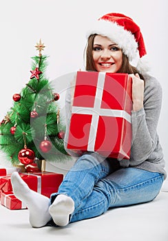 Christmas Santa hat isolated woman portrait hold christmas gift