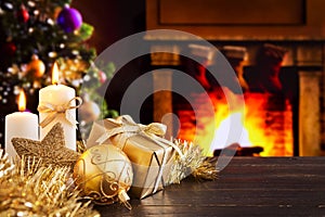 Christmas scene with fireplace and Christmas tree in the backgro