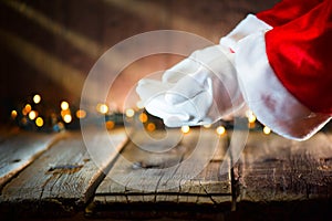 Christmas scene. Santa Claus showing empty copy space on the open hands palm for text