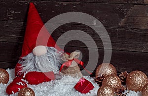 Christmas scene with Xmas dwarf decoration and snow