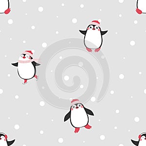 Christmas seamless pattern with cute penguins on grey background
