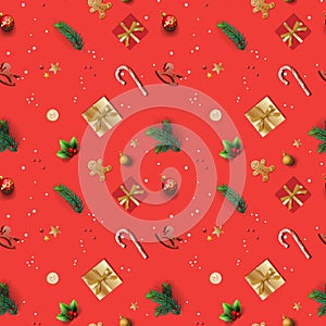 Christmas seamless pattern with gift boxes, candies, pine tree branches, candles. Wrapping paper or textile ornament