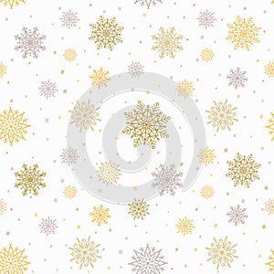 Christmas seamless pattern with golden and silver snowflakes. Christmas decoration gift wrapping paper.