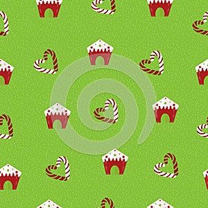 Christmas seamless pattern. Lollipops and gingerbread houses on a green background.