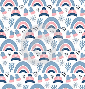 Christmas seamless pattern with mittens, hats, branches and snowflakes. Perfect for wallpaper, gift paper, pattern fills