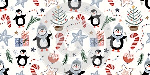 Christmas seamless pattern with penguins and seasonal elements
