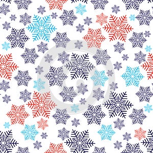 Christmas seamless pattern with red and blue snowflakes
