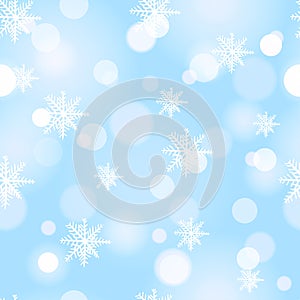 Christmas seamless snowflakes background with light boke