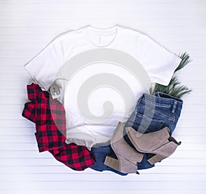 Christmas shirt mockup - white tshirt with buffalo plaid scarf, boots & jeans photo