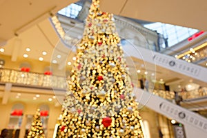 Christmas in the Shopping Center - Detail view with big Christmas Tree Blurred Background