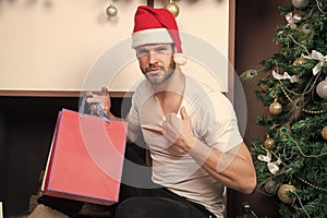 Christmas shopping time. i will be your santa. secret present from sexy man. xmas composition at home. macho man