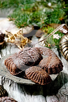 Christmas shortcrust cookies chocolate crescents with fir tree, molds, xmas decorations. Close up
