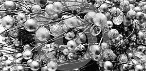 Christmas silver balls on twigs background