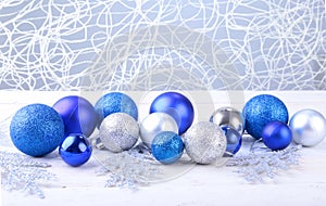 Christmas silver and blue balls isolated on silver background