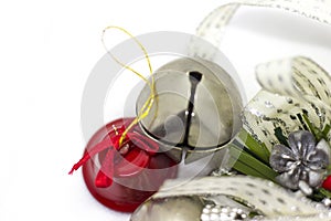 Christmas silver decoration with red ball details with white baxkground.