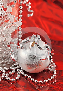 Christmas silver ornament of red background