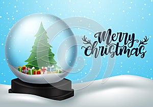 Christmas snow ball vector banner design. Merry christmas greeting text with snow globe xmas tree and gift elements.