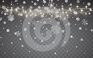 Christmas snow. Falling white snowflakes on dark background. Xmas Color garland, festive decorations. Glowing christmas lights.