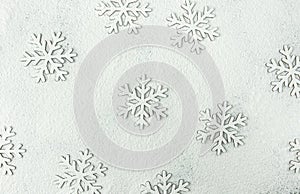 Christmas Snow Flakes Silhouette Pattern on Snowy White Background Powdered with Flour. New Year Holiday Greeting Card.Baking